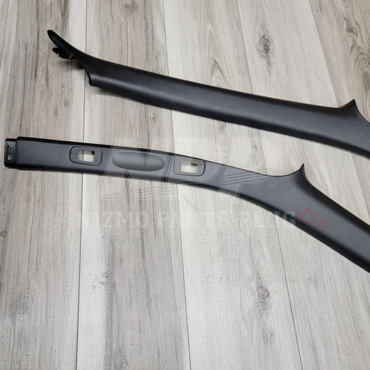 Black interior A-pillar garnish set for Nissan R34 Skyline Coupe. Clean, original condition.