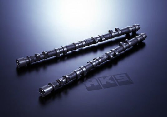 HKS camshaft set for VQ35DE (03-06 Nissan 350Z/Infiniti G35), two dark grey metal shafts on a blue background.
