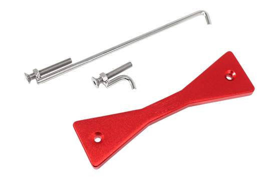 Red billet ZSPEC battery hold down bracket for Nissan R35 GTR with stainless steel hardware.