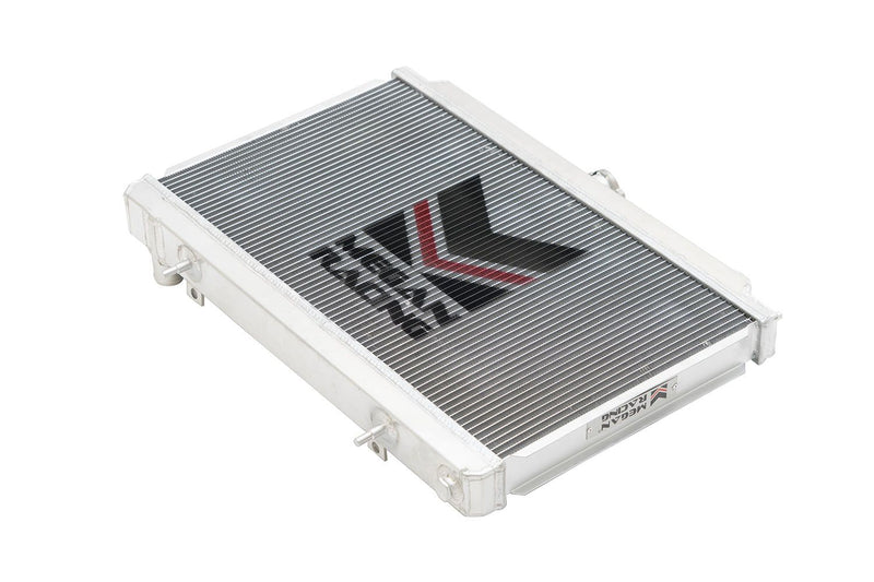 Load image into Gallery viewer, Megan Racing 3-row aluminum performance radiator for 1995-1998 Nissan 240SX (S14) with branded logo.
