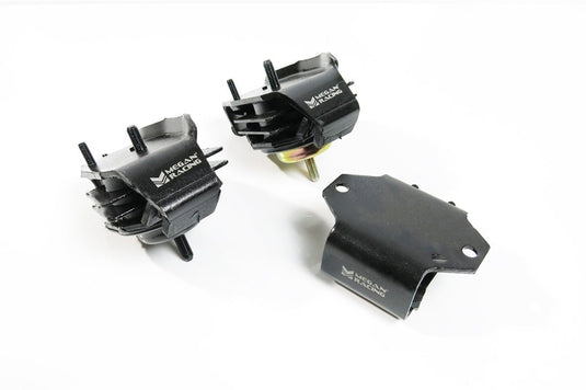 Three black Megan Racing reinforced engine mounts for Nissan 240SX S13/S14 on a white background.