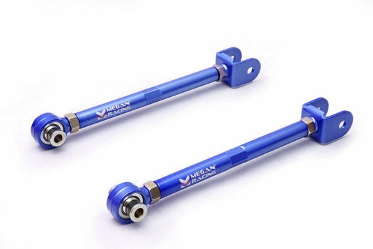 Blue Megan Racing rear adjustable toe control arms for Nissan 240SX S14, new condition.