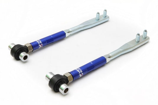 Blue Megan Racing forged front tension rods for Nissan S14/S15 and Infiniti Q45, new in box condition.