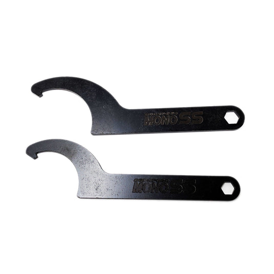 Two black Godspeed Mono SS adjustment wrenches for Nissan Skyline GT-R R32 coilovers.