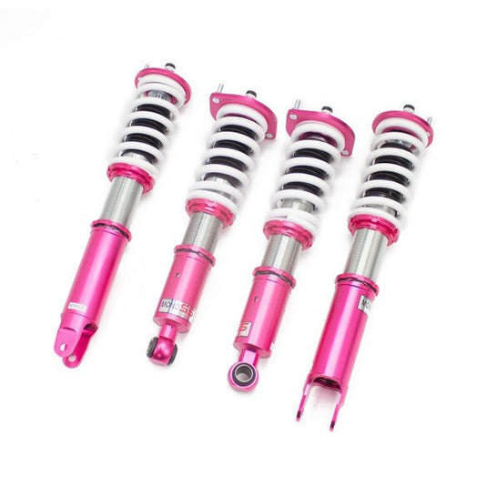 Godspeed coilovers for Nissan Skyline R32, featuring bright pink bodies and white springs on a white background.