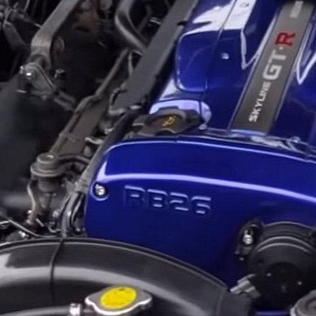 ZSPEC stainless bolt kit on a blue Nissan Skyline GT-R R32/R33/R34 RB26 engine cover.