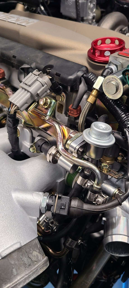 U.P.G RB26 fuel pressure adapter to OEM rail