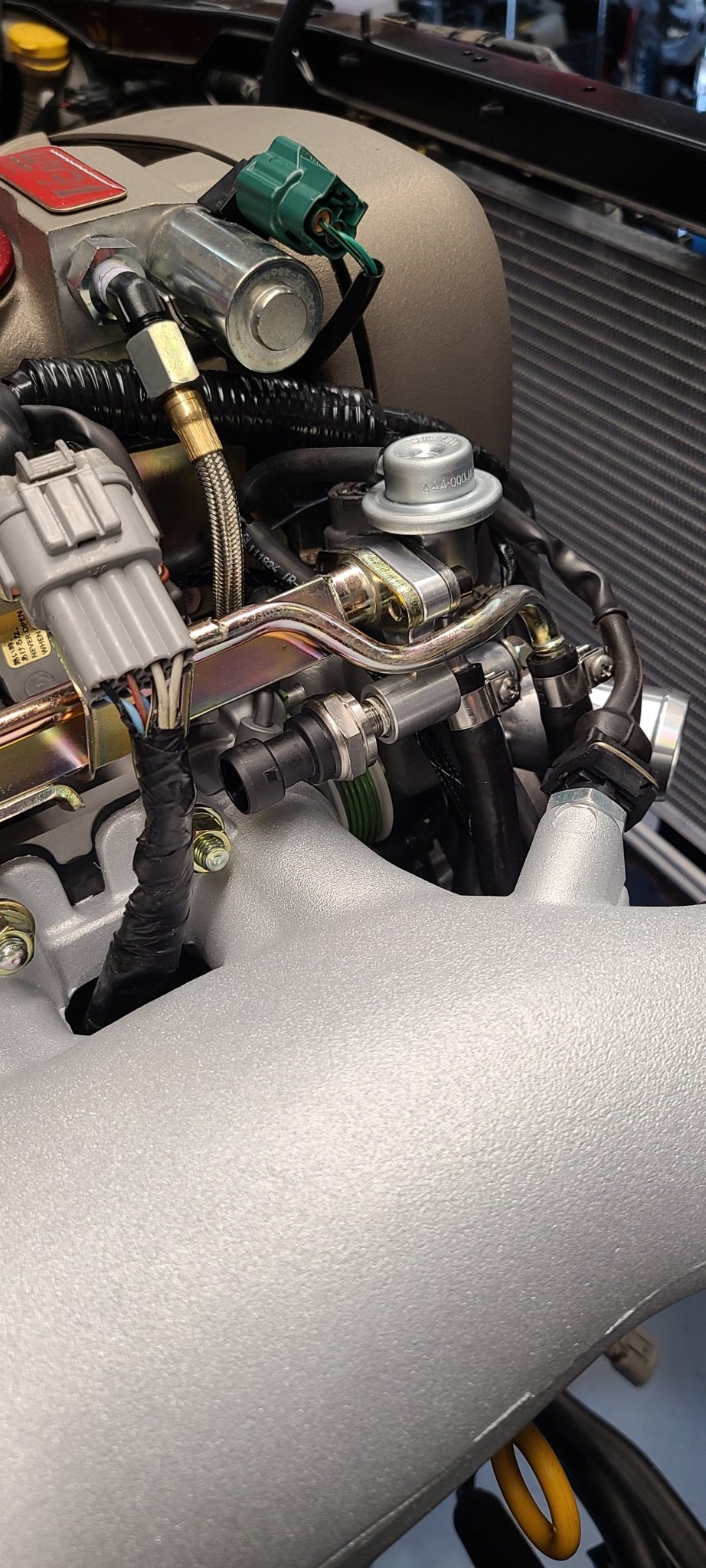 U.P.G RB26 fuel pressure adapter to OEM rail