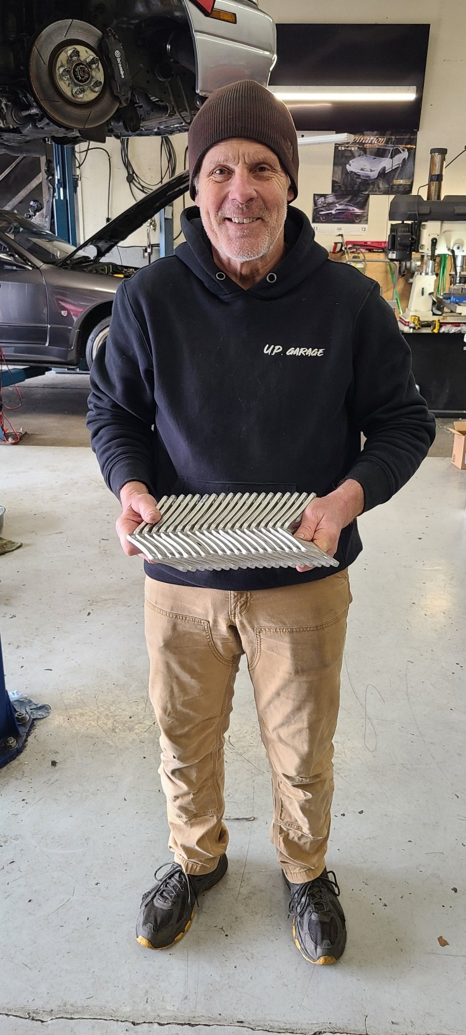 U.P.G Skyline GTR oil filter relocation bracket for Greddy plate.