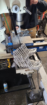 U.P.G Skyline GTR oil filter relocation bracket for Greddy plate.