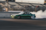 s14 nissan 240sx green being drifted