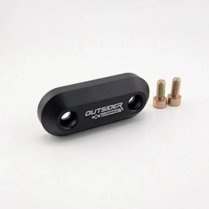ギャラリービューアに画像をロードする, Black anodized aluminum throttle cable firewall block-off plate for Toyota Supra MKIV with two included mounting bolts.
