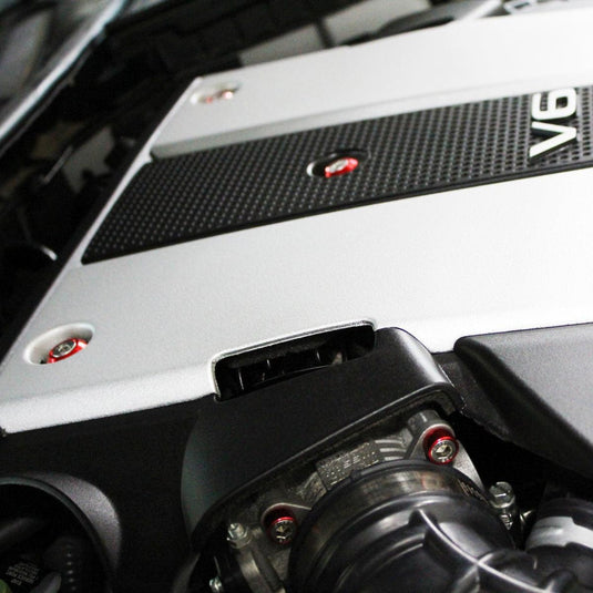 ZSPEC red billet dress-up bolts installed on an Infiniti VQ37 engine cover (09-17 G37/Q50).