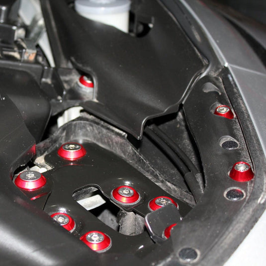 ZSPEC red anodized billet aluminum fastener kit installed on an Infiniti G37/Q50 engine bay.