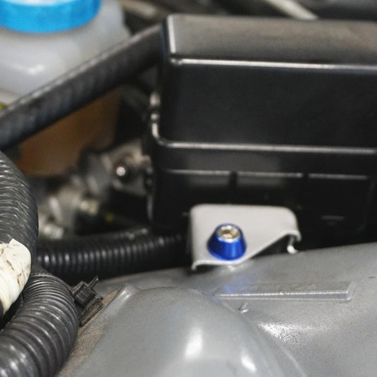 ZSPEC blue billet fastener installed on a Nissan R35 GTR engine bay bracket.