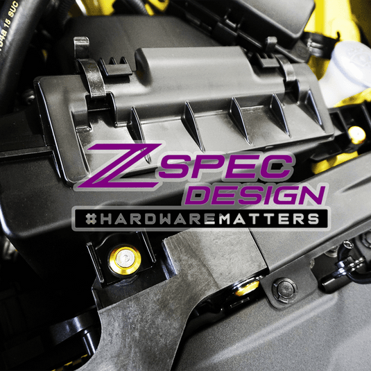 Gold ZSPEC dress-up bolts installed on a Nissan Z RZ34 engine bay, featuring stainless steel and billet construction.