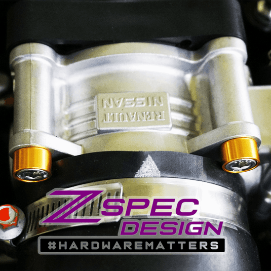 ZSPEC gold billet dress-up bolts installed on a Nissan Z RZ34 engine component.