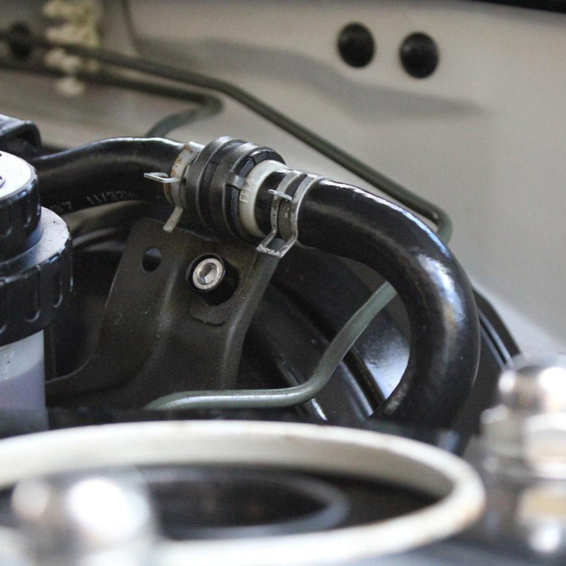 Cargue la imagen en el visor de la galería, ZSPEC stainless fastener kit installed on a Nissan 240SX S14 engine bay bracket with a black billet finish.
