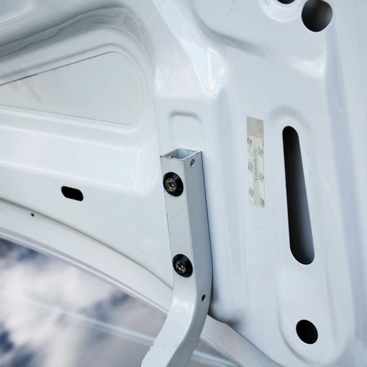 ZSPEC stainless fastener kit installed on a white Nissan 240SX S14 hood hinge with black billet finish.
