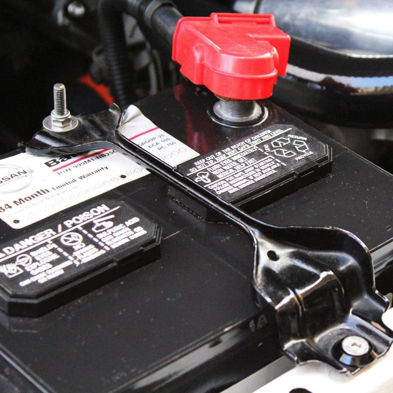 Cargue la imagen en el visor de la galería, ZSPEC stainless steel battery tie-down bolt kit installed on a 1995-1998 Nissan 240SX S14 battery.
