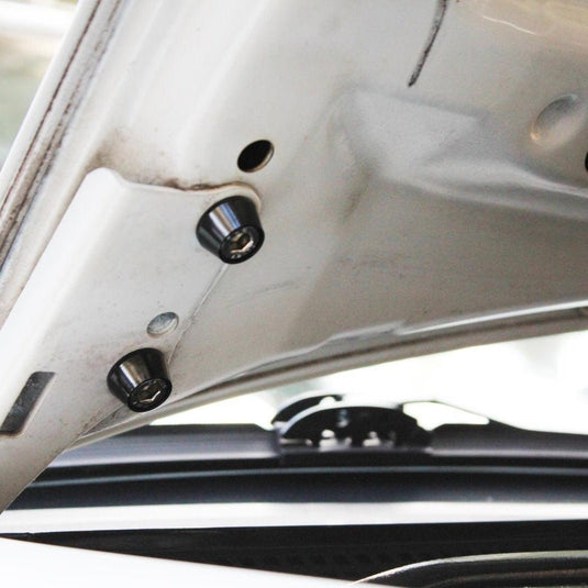 ZSPEC black billet fastener kit installed on a Nissan 240SX S14 hood hinge.
