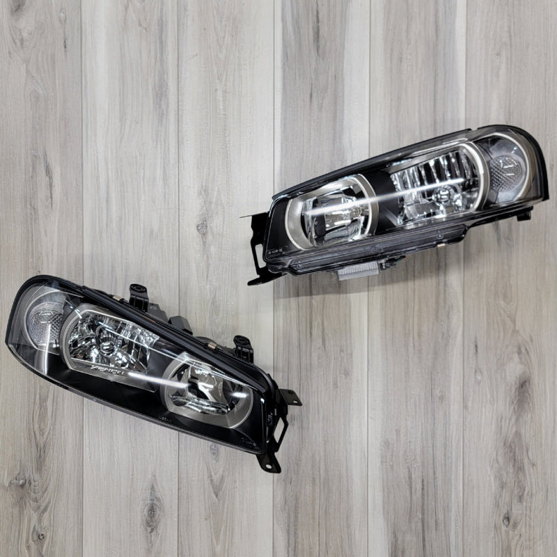 Load image into Gallery viewer, Nissan R34 Skyline GTT/GT-R H.I.D. Headlight Set Complete - NizmoPartsPlug
