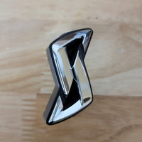 Nissan R34 Skyline GT Front Grill "Skyline" Emblem