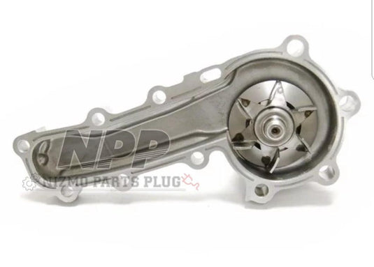New Old Stock Nismo N1 silver water pump for Nissan RB25/RB26 engines, shown from above.