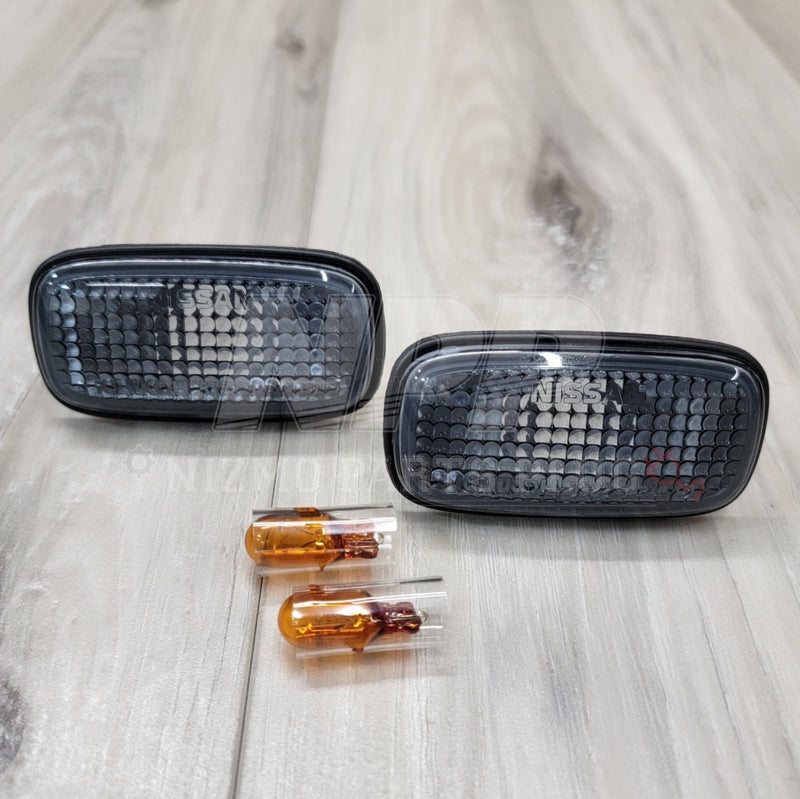 Load image into Gallery viewer, Nismo Smoked Side Marker Lamp Set (S15 Silvia/R34 GT-R) - NizmoPartsPlug
