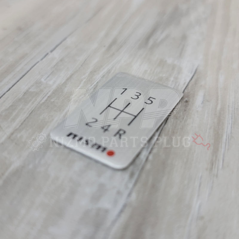 Load image into Gallery viewer, Nismo 5-Speed Manual Shift Pattern Brushed Emblem - NizmoPartsPlug
