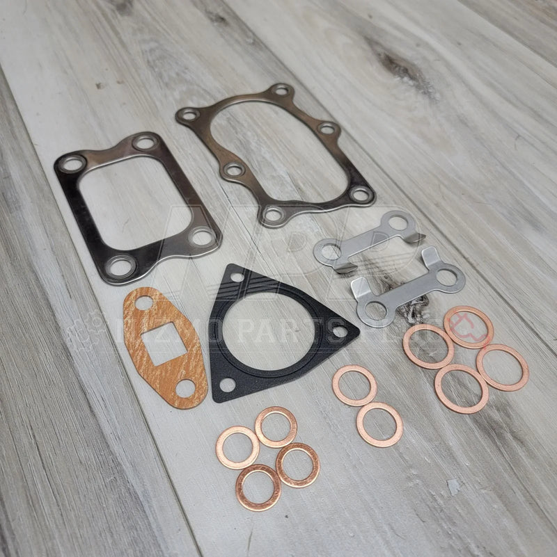 Load image into Gallery viewer, Nissan Skyline RB20DET RB25DET Turbocharger Gasket Kit - NizmoPartsPlug
