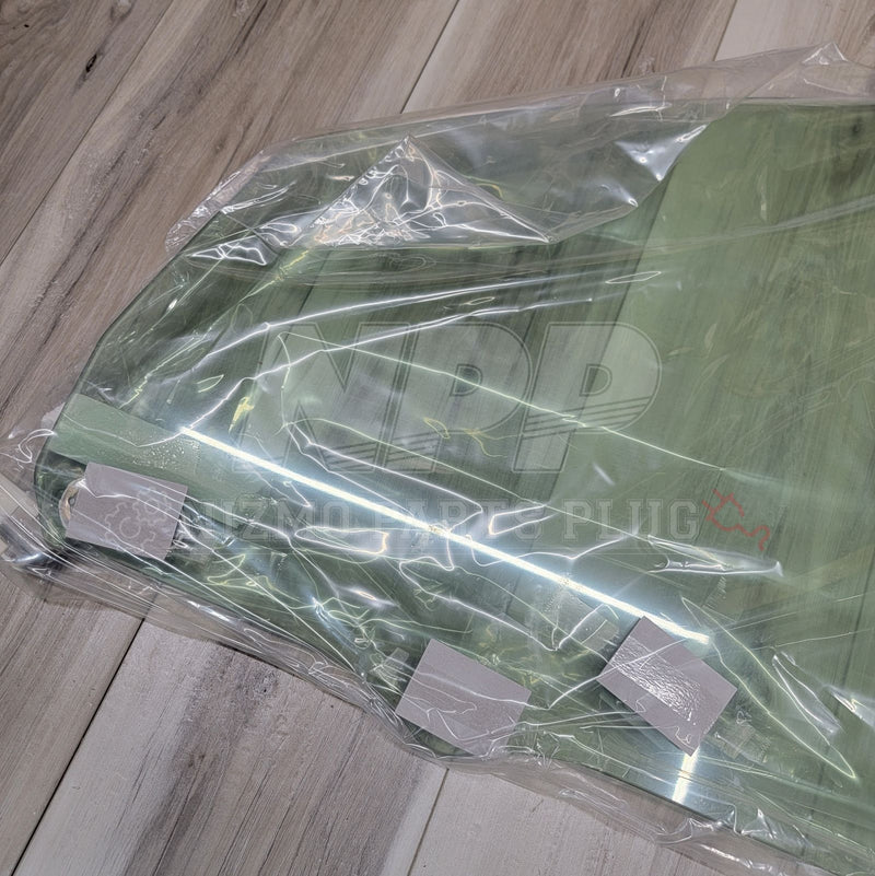 Load image into Gallery viewer, Nissan R34 Skyline Coupe Front Door Glass Assembly LH - NizmoPartsPlug
