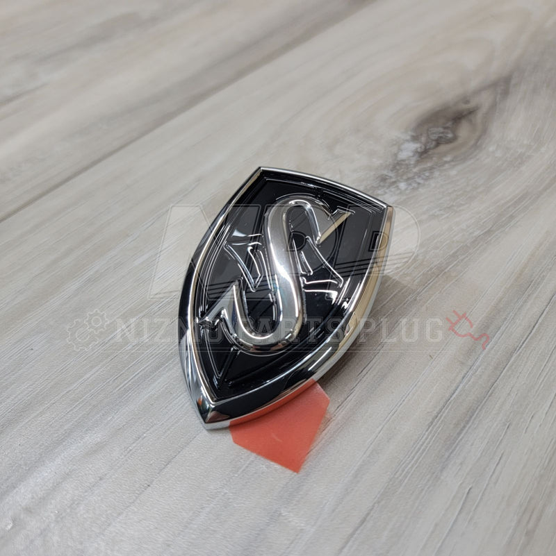 Load image into Gallery viewer, Nissan S14 Silvia JDM Black Hood Emblem (Discontinued) - NizmoPartsPlug
