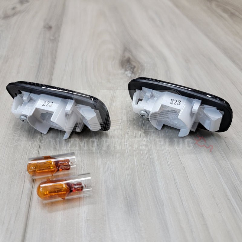 Load image into Gallery viewer, Nissan R33/R34 GTR Nismo Smoked Side Winker Lamp Kit - NizmoPartsPlug

