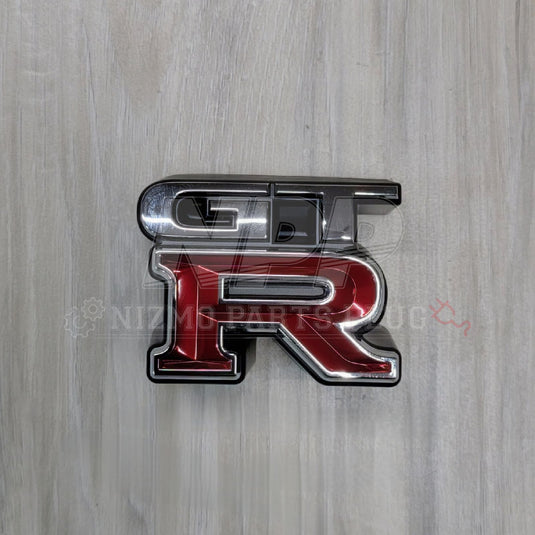 Nissan R34 Skyline GTR Front Grill Emblem - NizmoPartsPlug