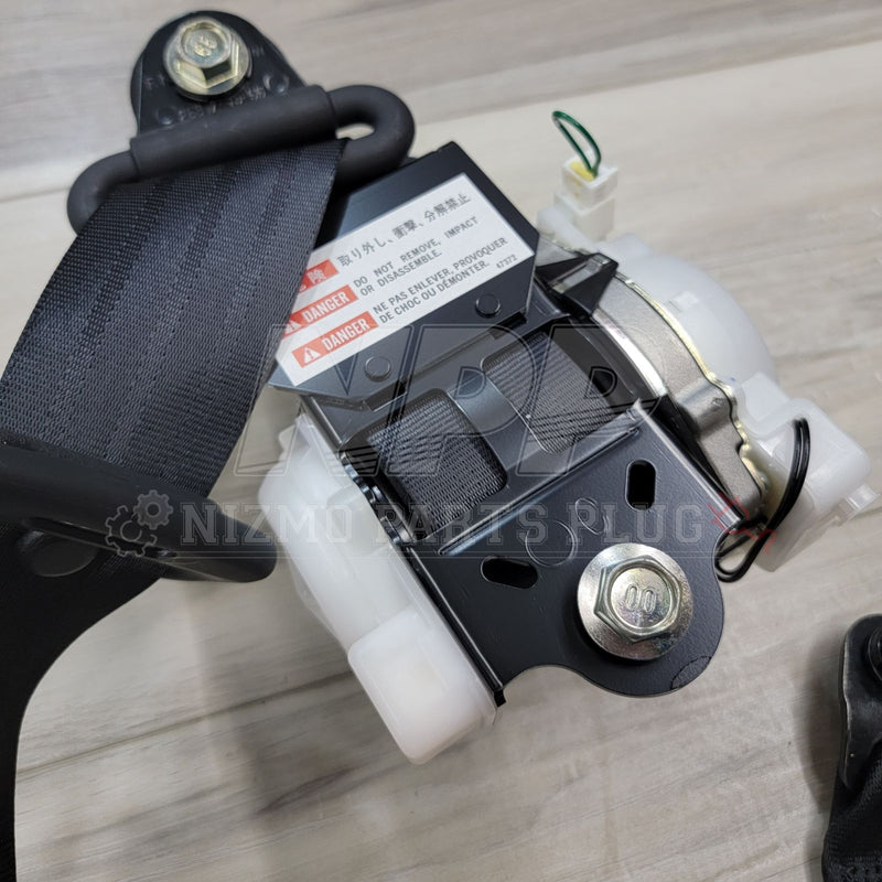 Load image into Gallery viewer, Nissan R34 Skyline GTR Front Seat Belt Retractor Pre-Tensioner Set - NizmoPartsPlug
