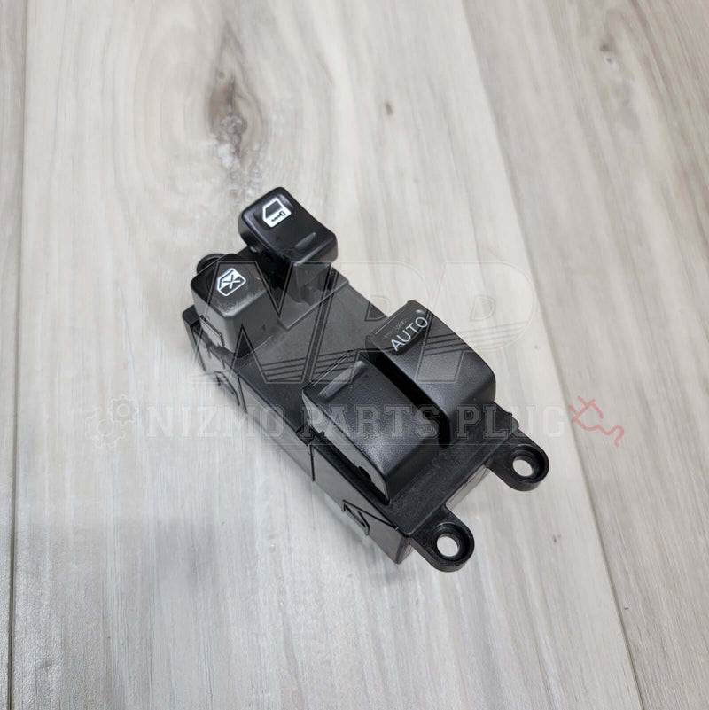 Load image into Gallery viewer, Nissan R34 Skyline Master Power Window Switch Assembly (Late Model) - NizmoPartsPlug
