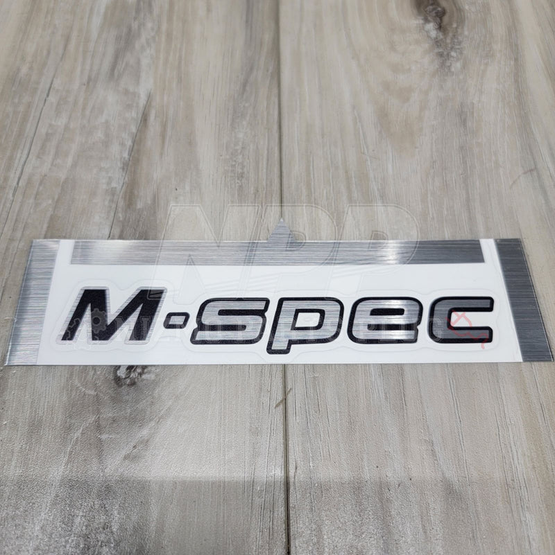 Load image into Gallery viewer, Nissan R34 Skyline GT-R M-Spec Emblem Trunk Decal - NizmoPartsPlug
