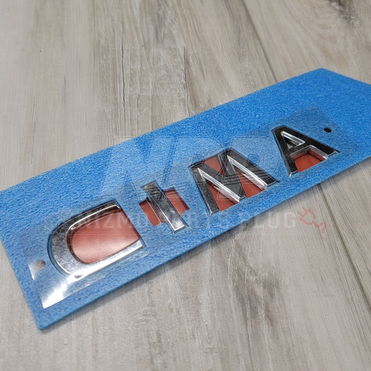 Nissan Q45 JDM Cima Trunk Emblem - NizmoPartsPlug