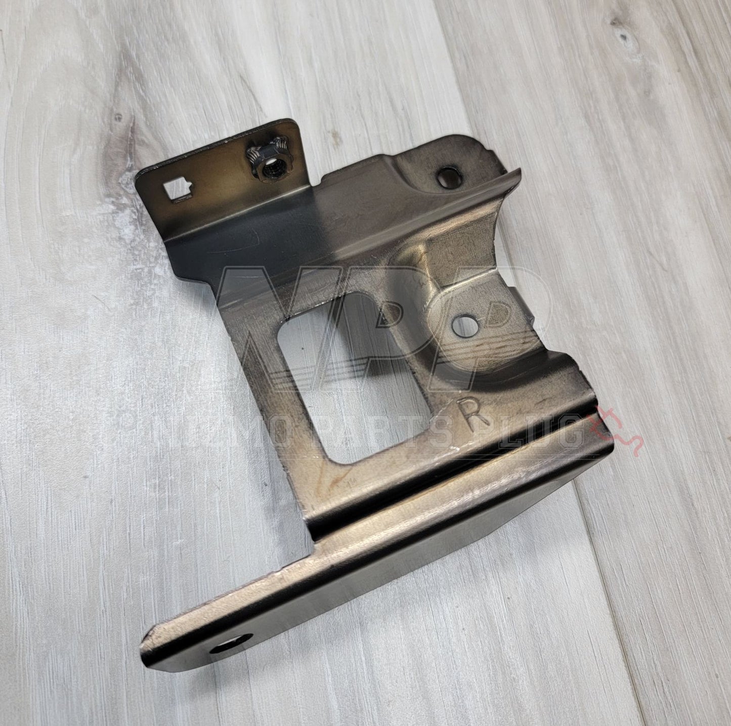 Nissan R34 Skyline GTR Headlight Bracket Set