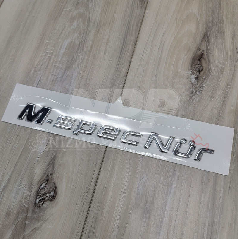 Load image into Gallery viewer, Nissan R34 Skyline GT-R M-Spec Nür Trunk Emblem - NizmoPartsPlug
