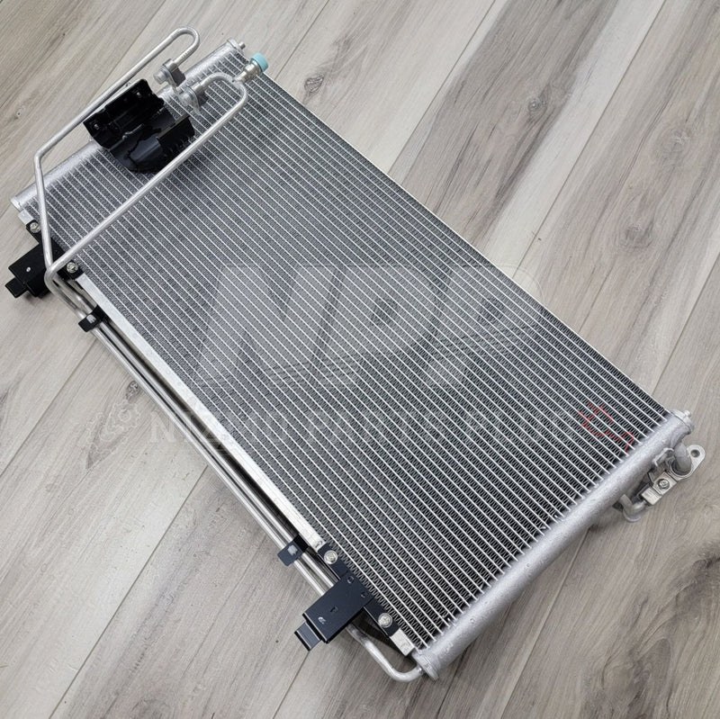 Load image into Gallery viewer, Nissan R34 Skyline GTR Air Conditioner Condenser Assembly - NizmoPartsPlug
