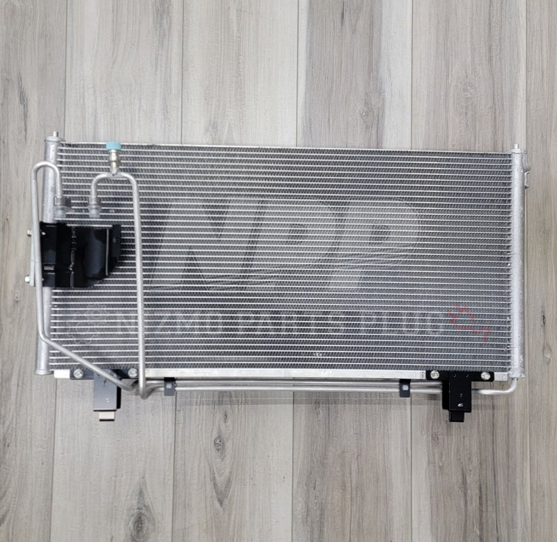 Load image into Gallery viewer, Nissan R34 Skyline GTR Air Conditioner Condenser Assembly - NizmoPartsPlug
