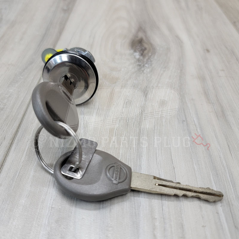 Load image into Gallery viewer, Nissan R34 Skyline Coupe Trunk Cylinder Lock Kit (Late Model) - NizmoPartsPlug
