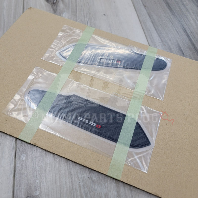 Load image into Gallery viewer, R33 Skyline Nismo Carbon Fiber Door Handle Protector Kit - NizmoPartsPlug
