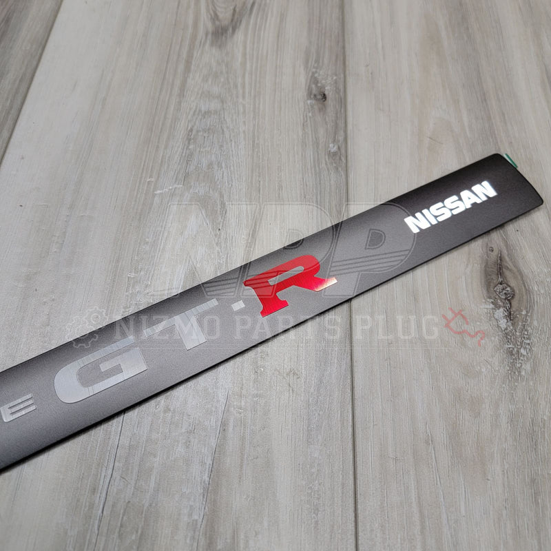 Load image into Gallery viewer, Nissan R34 Skyline GTR Nür Center Valley Cover Emblem - NizmoPartsPlug
