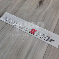 Emblema del maletero del Nissan R34 Skyline GT-R Vspec II