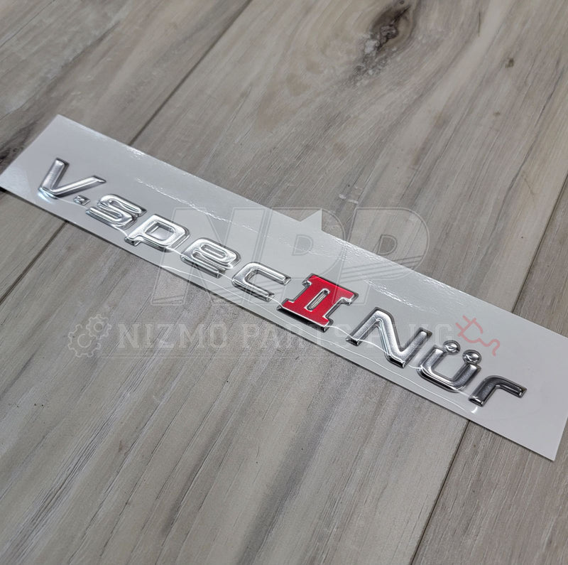 Load image into Gallery viewer, Nissan R34 Skyline GT-R Vspec II Nür Trunk Emblem - NizmoPartsPlug
