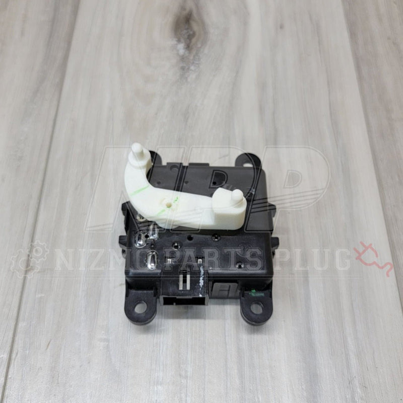 Load image into Gallery viewer, Black and white Nissan S14 Silvia/Stagea A/C air mix door actuator on a wood background.
