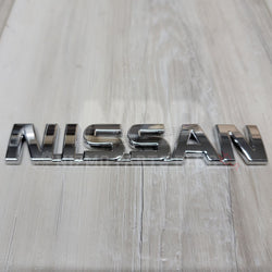 R32 Skyline "Nissan" Trunk Lid Emblem